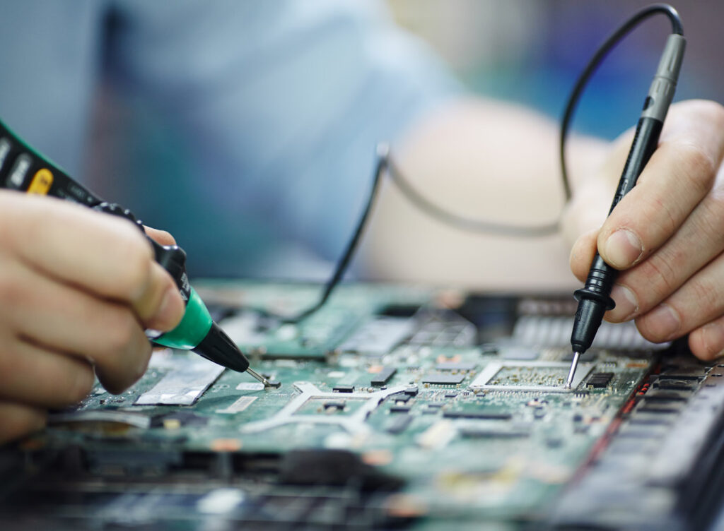 checking current laptop circuit board.jpg